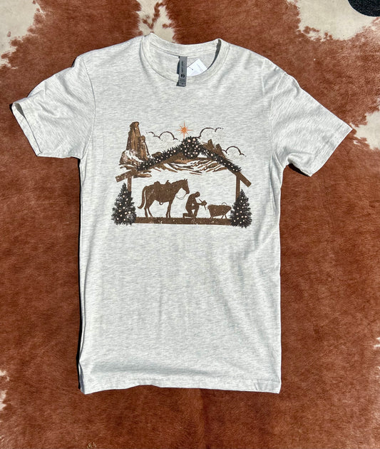 Praying Cowboy at Christmas Manger